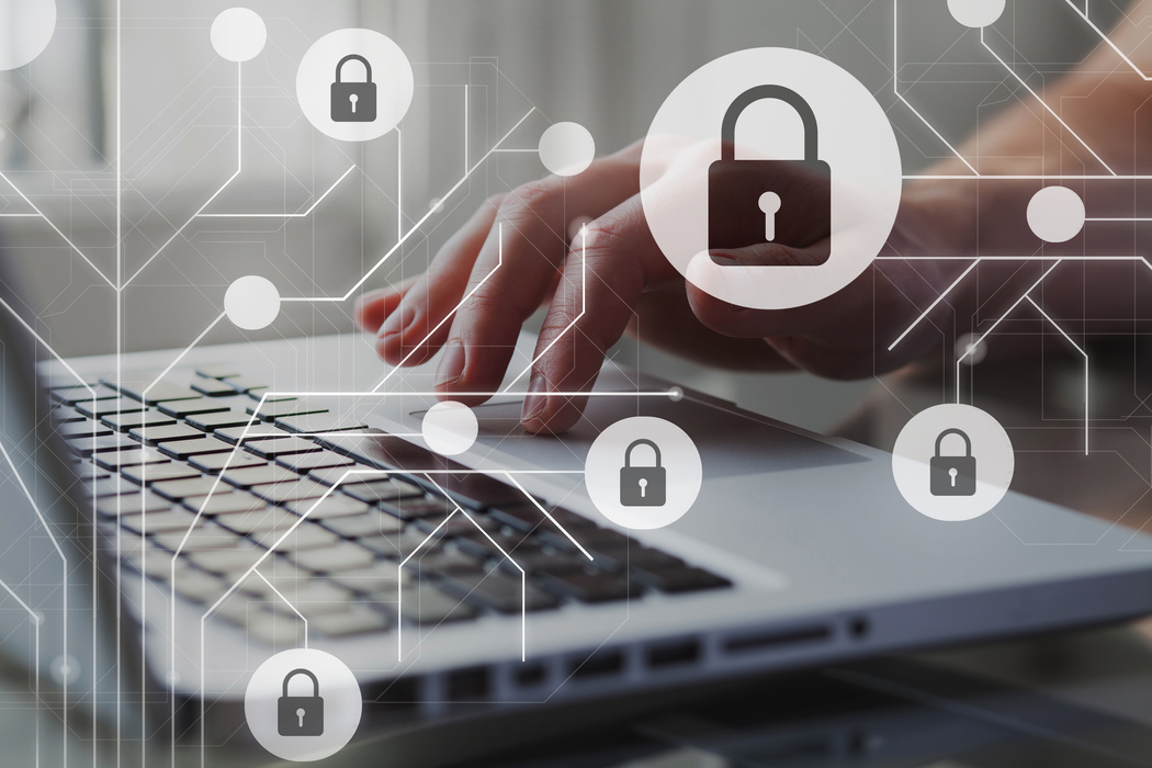 Cyber internet security concept. GDPR and cybersecurity. Protection of private personal data. A person using internet on laptop on the background.